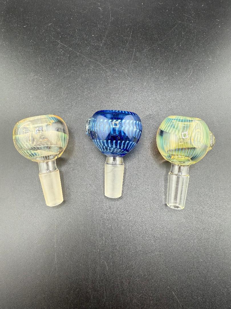 Three handcrafted glass fumed 14mm bowls featuring vibrant color-changing designs.