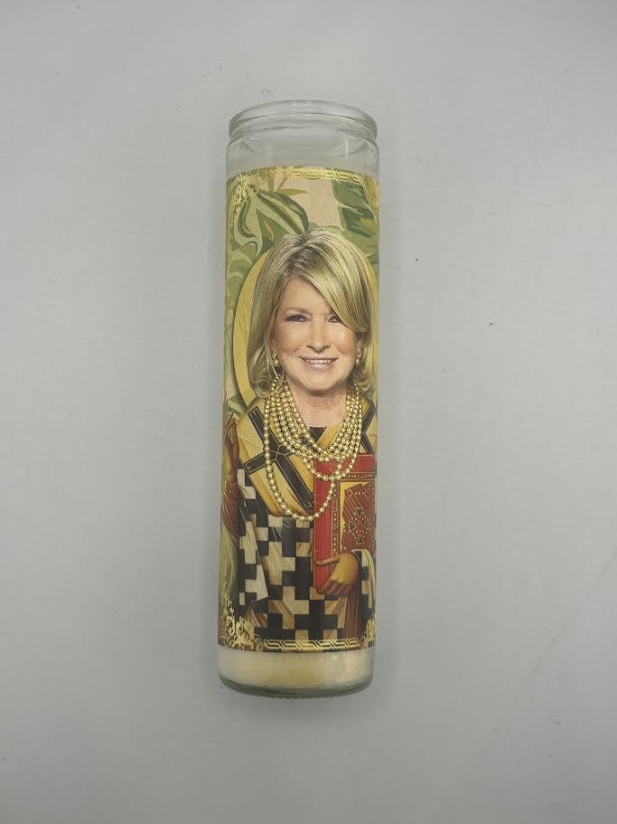 Bobbyk Saint Candles featuring a parody-inspired design of a cultural icon in a tall white prayer candle.
