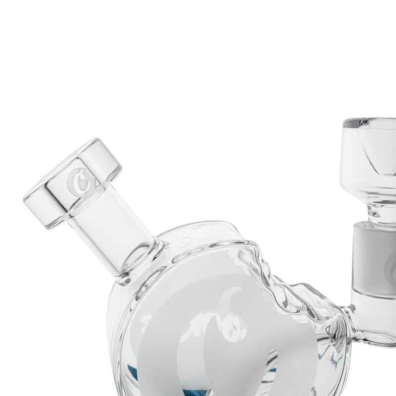 Close-up of a durable borosilicate glass Cookie Bite Bubbler pipe with iconic design.