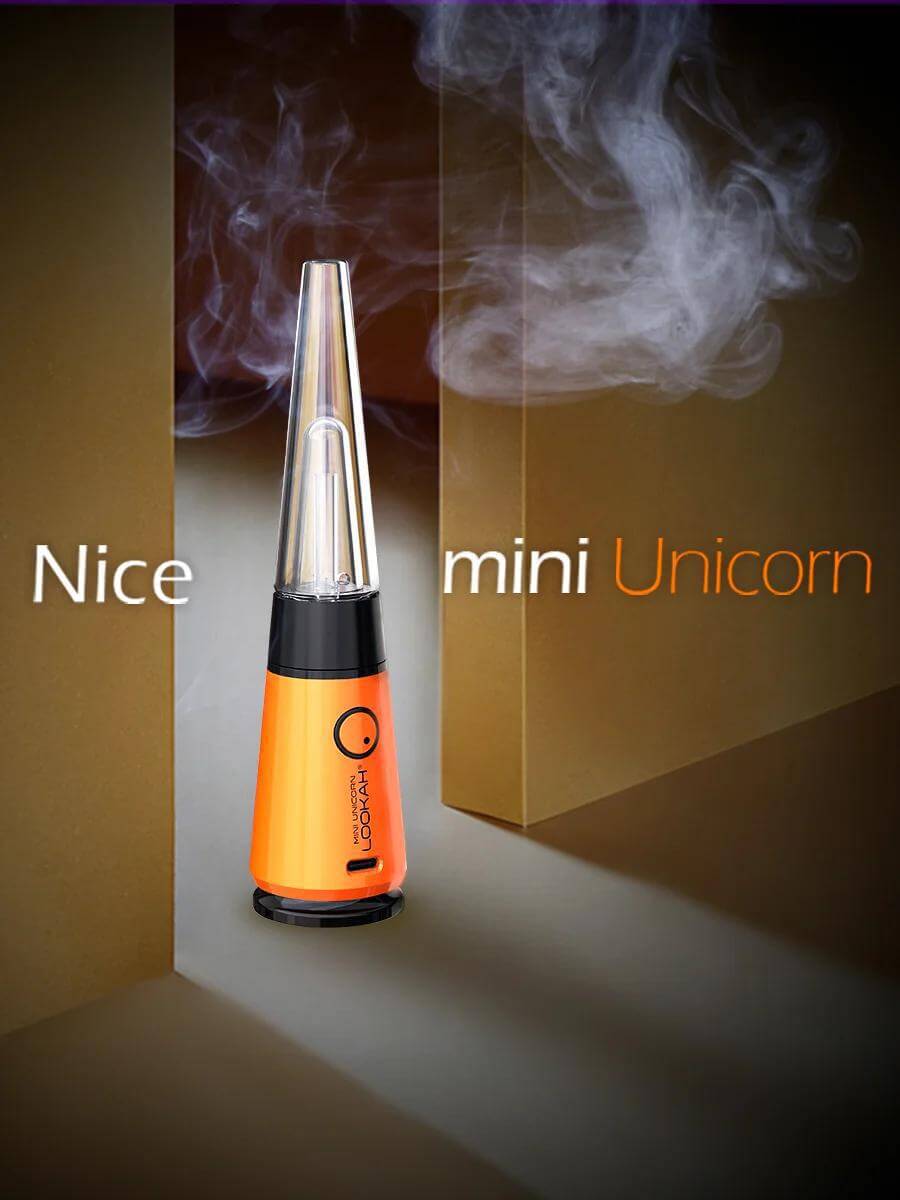 Lookah Unicorn Mini Electric Dab Rig with smoke background showcasing its portable design and magnetic top.