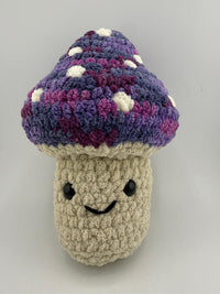 Plush Delight Crochet Mushroom Plushy - Handmade, soft, and whimsical design perfect for cozy decor.