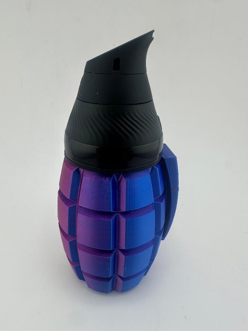Puffco Proxy Core Grenade Cup designed in vibrant colors, resembling a tactical grenade for enhanced setup.