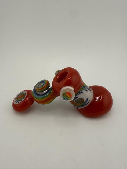 Colorful Mcdoogle Worked Hammer pipe in red with decorative swirls and patterns on the bowl.