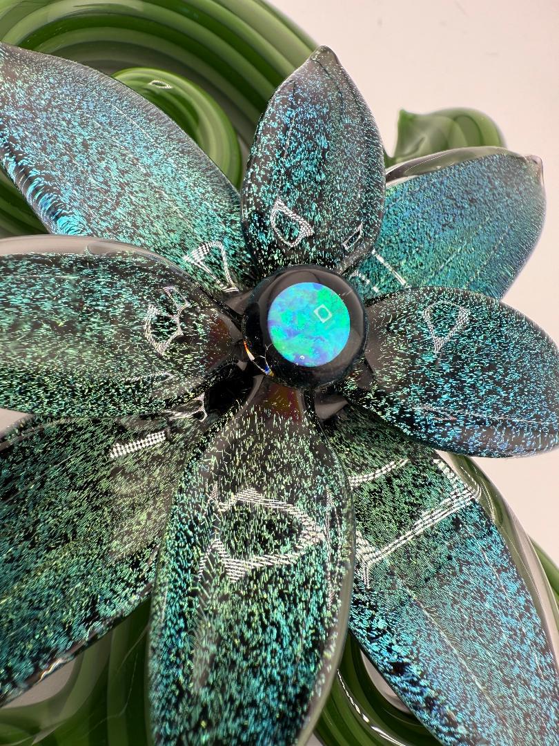 Close-up of Filla John Spring 2025 Organic Bloom Dichroic Pipe featuring vibrant dichroic flower and opal accent.