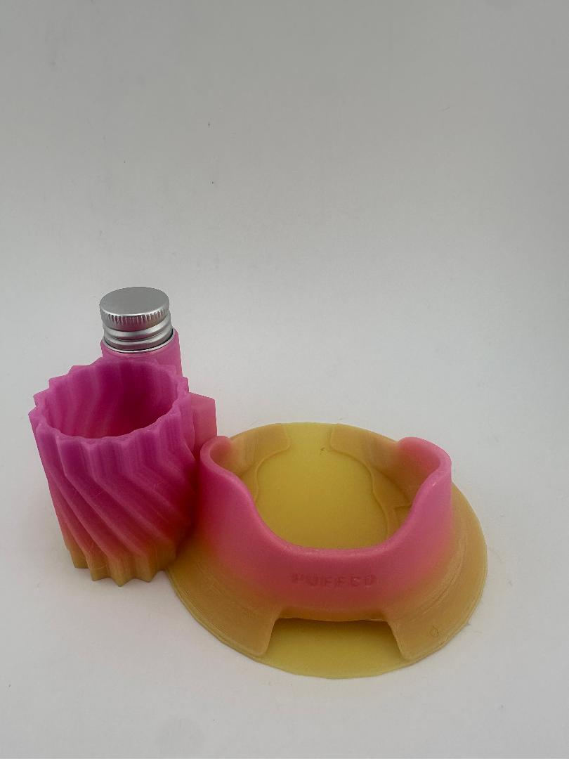 Kandy Custom 3-D Prints Puffco Peak Pro ISO Base Station in pink, designed for organizing cleaning supplies.