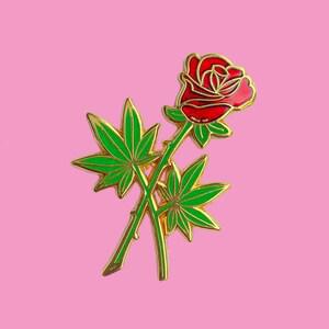 Bobby Pins Co. Keychain - Rose Bud featuring a red rose and cannabis leaves in vibrant enamel design.