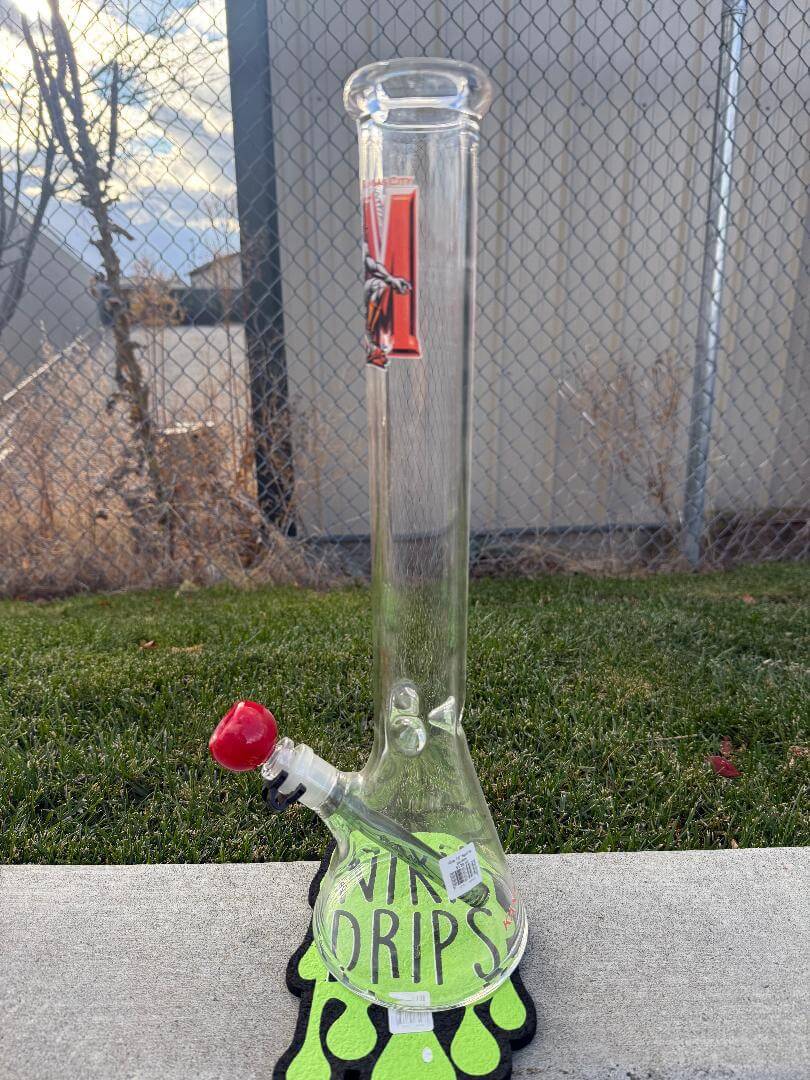 AFM Glass 18" Beaker - Sports displayed on grass with vibrant colors and team logos.