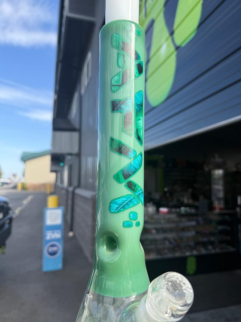 AFM Glass 18" Quasar Glass Leaf Flower Beaker 14mm 45° with green and white design outdoors