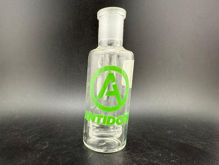 Antidote Glass 14mm 90° Ash Catcher with logo on transparent borosilicate glass design.