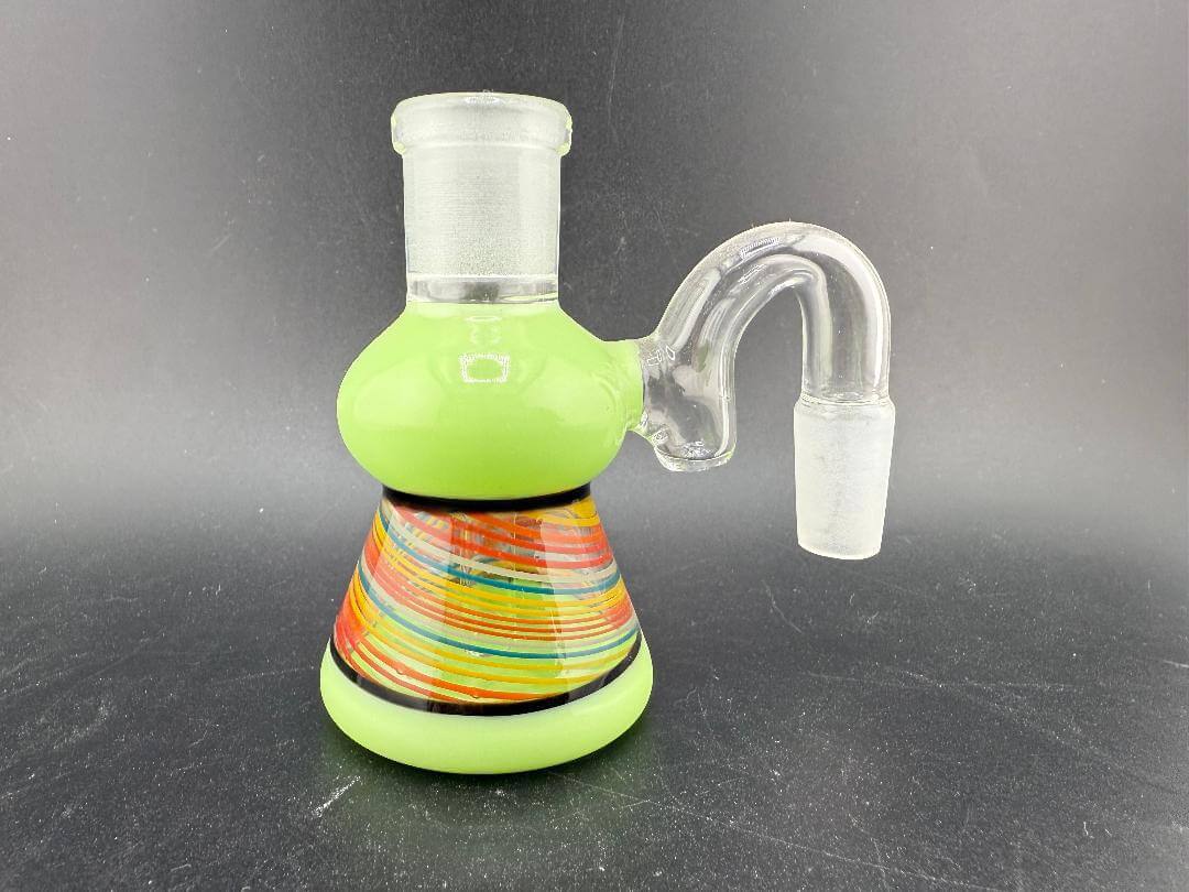 Antidote Glass14mm 90° Retti Line Worked Ash Catcher in vibrant green with colorful line work design.