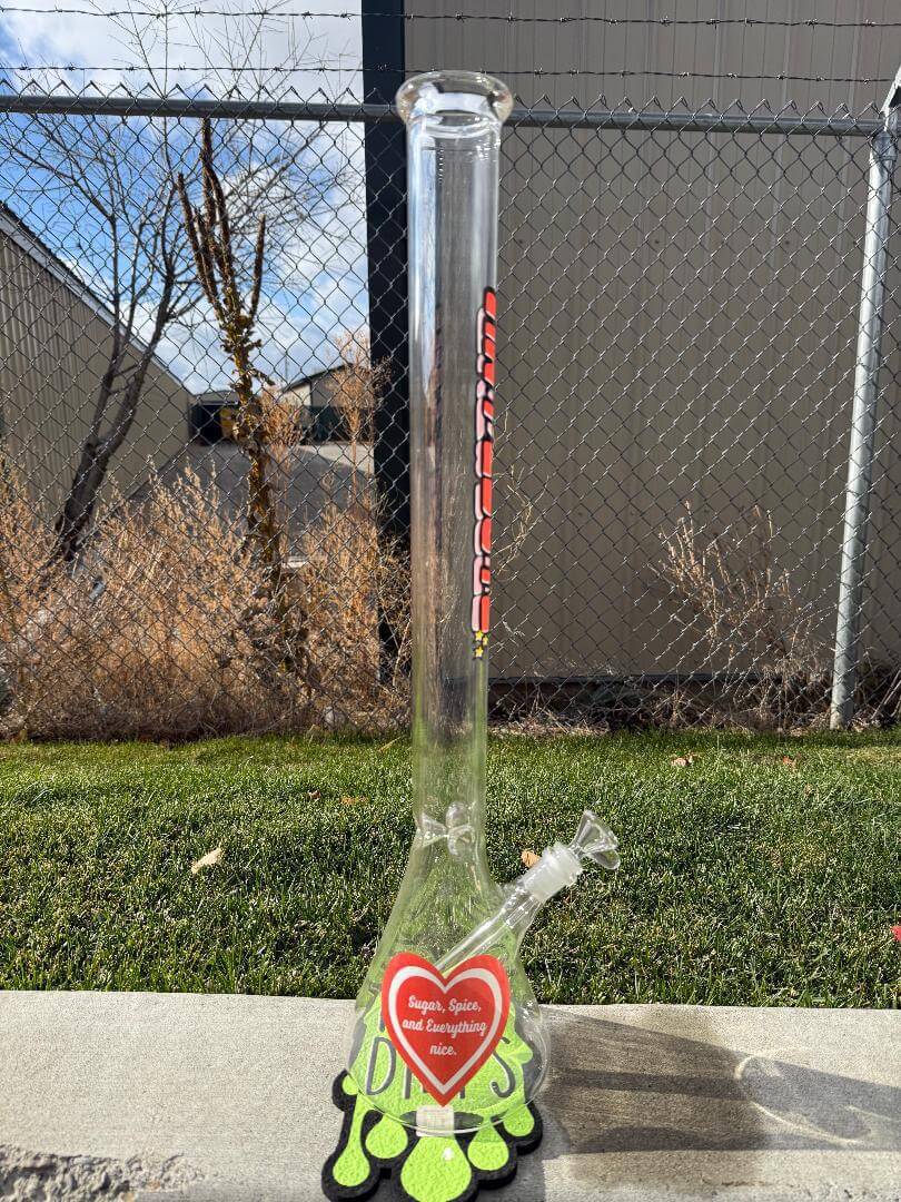 Antidote Glass 24" Beaker 14mm 45° - Powerpuff with vibrant colors and fun design placed outside.