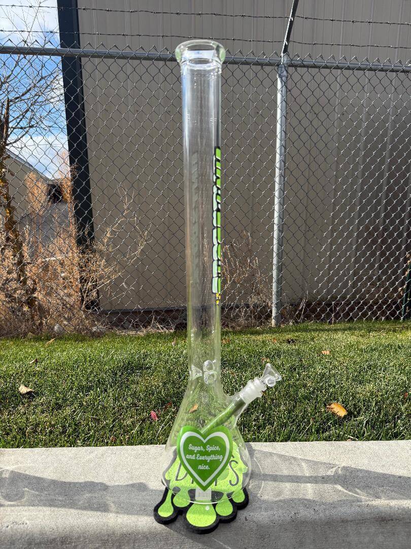 Antidote Glass 24" Beaker 14mm 45° - Powerpuff standing on the grass with vibrant colors and a unique design.