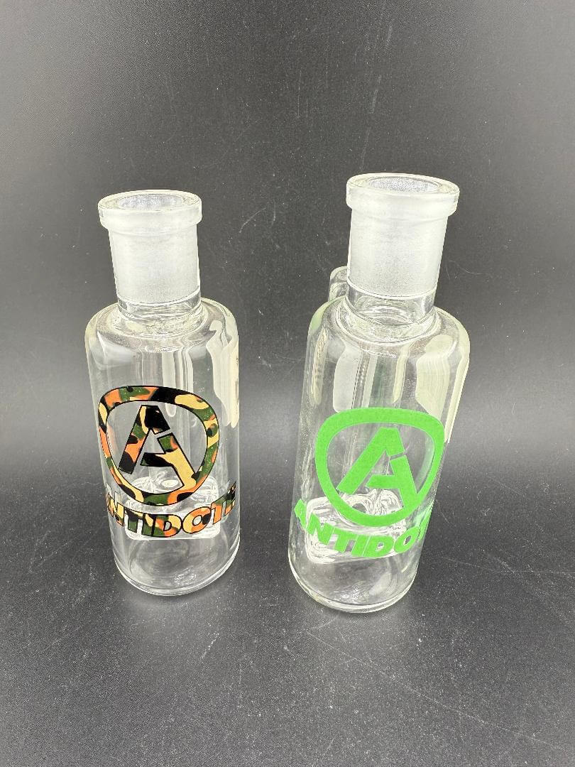 Antidote Glass 14mm 90° Ash Catcher products on display, showcasing durability and design.