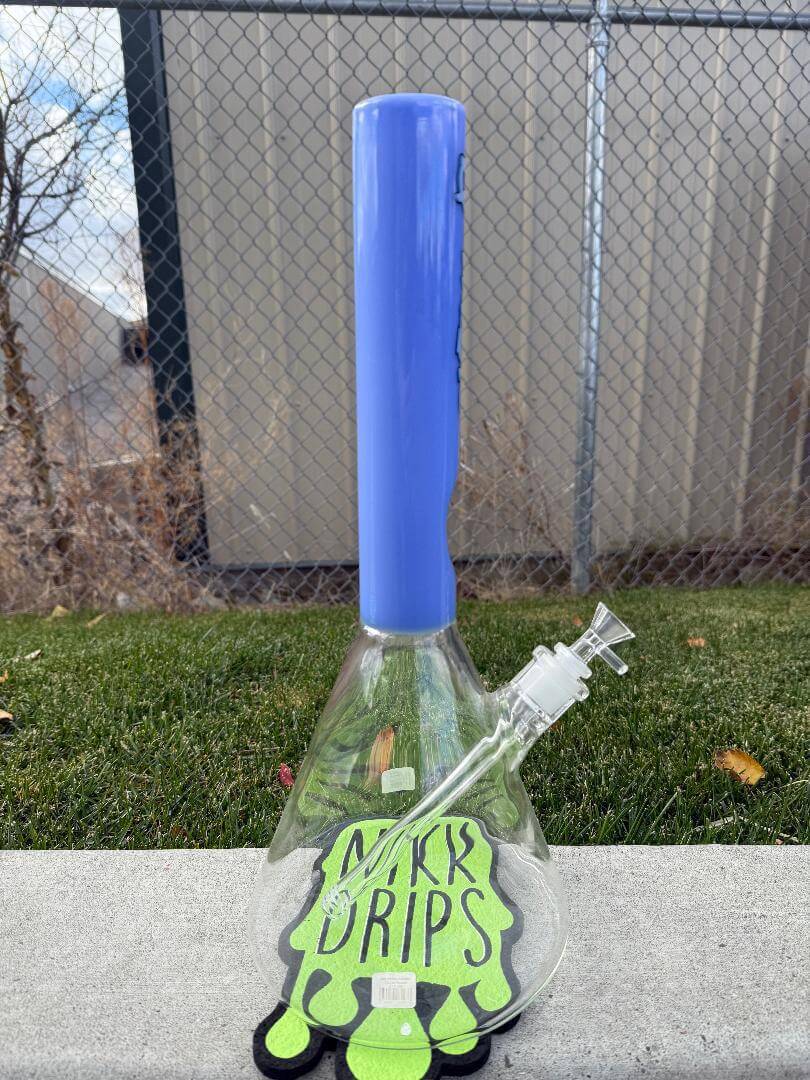 Antidote Glass Big Base Beaker Blue 14mm 45° with purple neck and water filtration design on display.