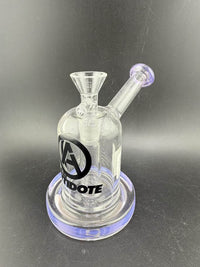 Antidote Glass Capsule Rig 14mm 90° in transparent design with purple accents and logo detail.