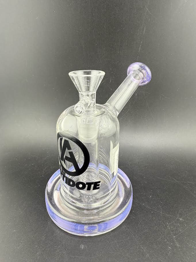 Antidote Glass Capsule Rig 14mm 90° in transparent design with purple accents and logo detail.