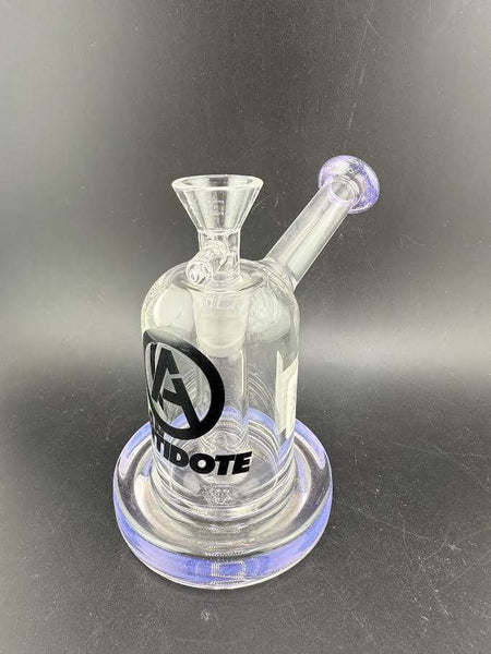 Antidote Glass Capsule Rig 14mm 90° in transparent design with purple accents and logo detail.