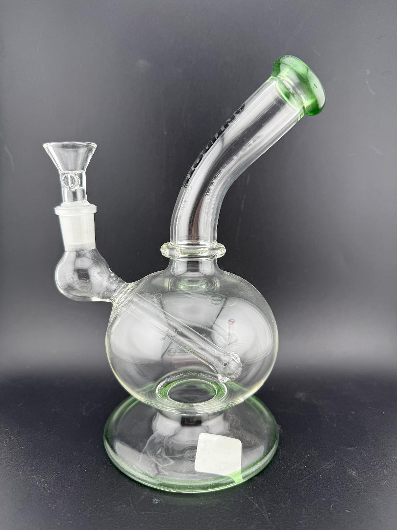 Antidote Glass Orbit Ball Rig 14mm 90° with unique orb-shaped chamber and green accents for enhanced water filtration.
