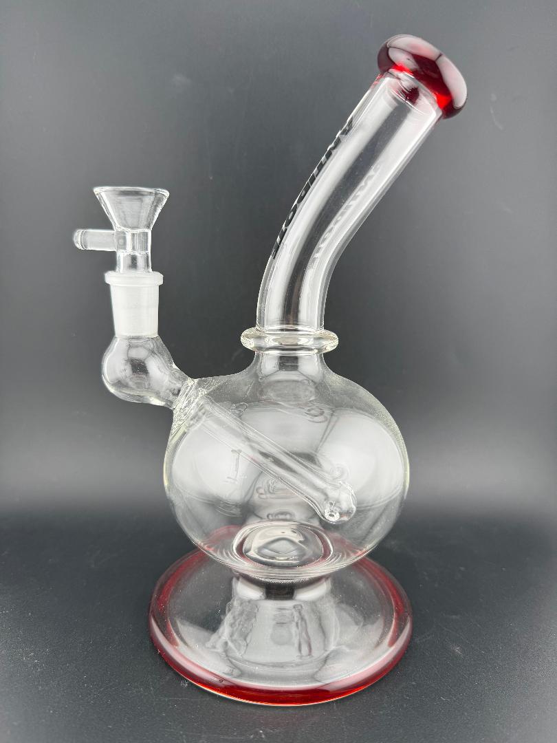 Antidote Glass Orbit Ball Rig 14mm 90° with clear borosilicate glass and red accents for smooth filtration and durability.