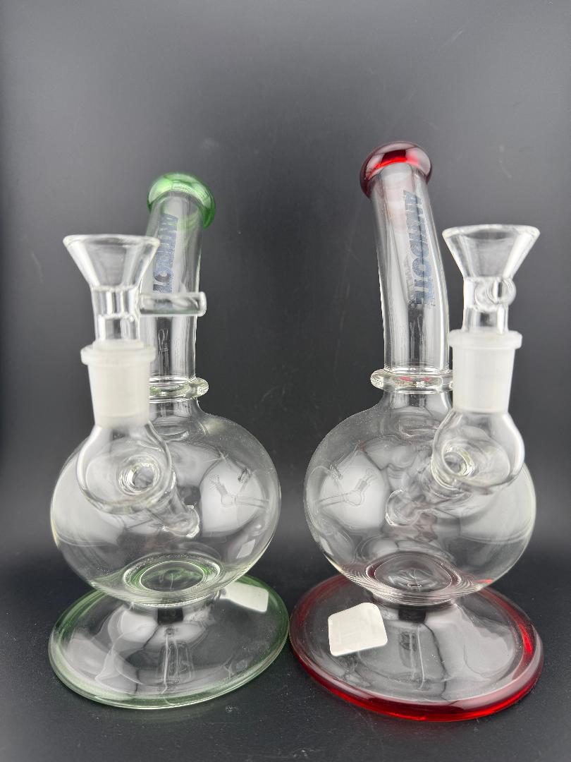 Antidote Glass Orbit Ball Rig 14mm 90° in red and green showcasing innovative design and smooth filtration.