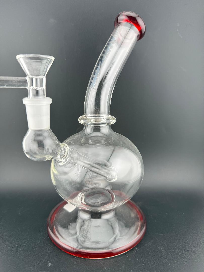 Antidote Glass Orbit Ball Rig 14mm 90° featuring orb-shaped chamber and smooth filtration in clear and red design.