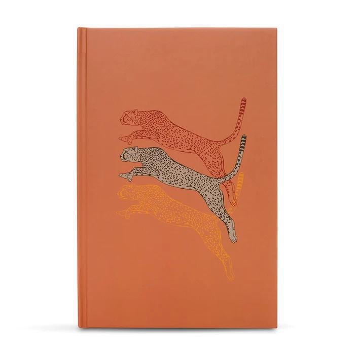 Ark Made Leaping Leopards Lined Journal featuring leaping leopard design on a vibrant orange cover.
