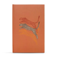 Ark Made Leaping Leopards Lined Journal featuring leaping leopard design on a vibrant orange cover.