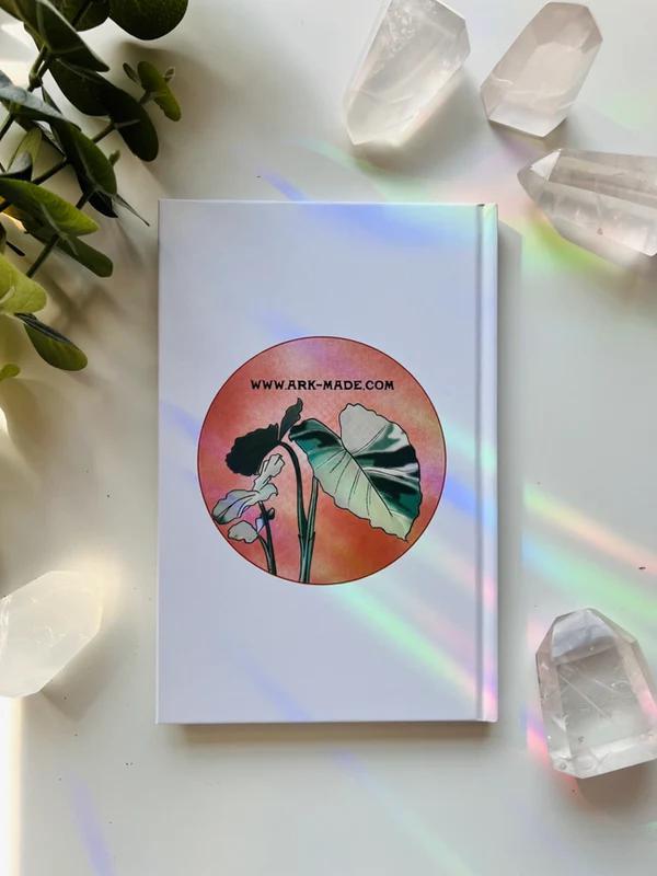 Ark Made Remain Rooted Lined Journal with botanical illustration and colorful design.