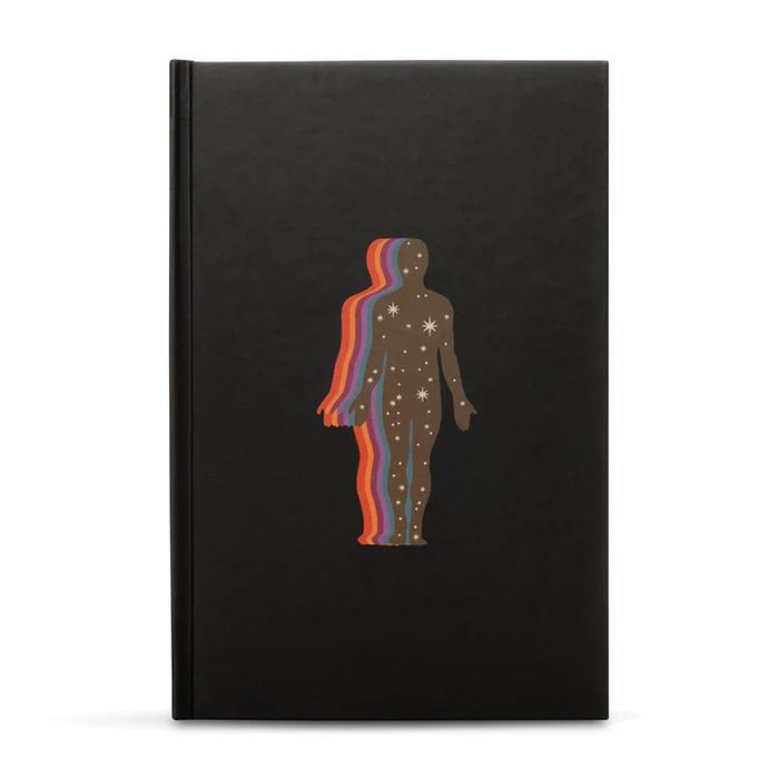 Ark Made The Self Lined Journal with colorful cosmic design on a black cover.