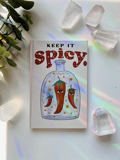 Ark Made Spicy Lined Journal featuring a colorful design with peppers and the phrase 'Keep It Spicy'.