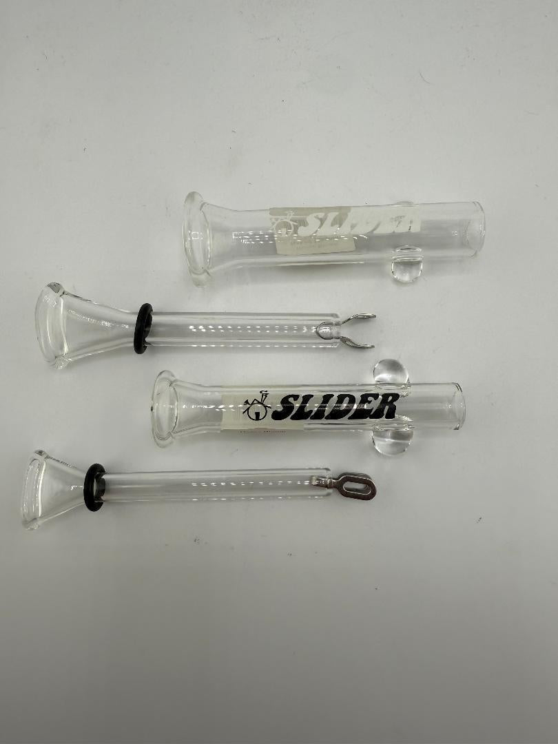 Home Blown Glass Naked Slider collection featuring Blunt and Magnum sizes, handcrafted glass design for smooth sessions.