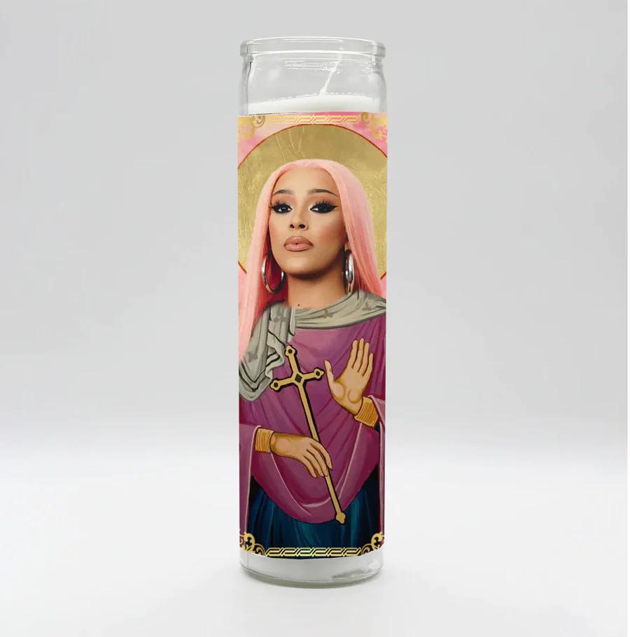 Bobbyk Saint Candles featuring a tall white prayer candle with a pop culture icon design.
