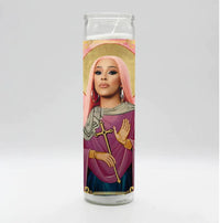Bobbyk Saint Candles featuring a tall white prayer candle with a pop culture icon design.