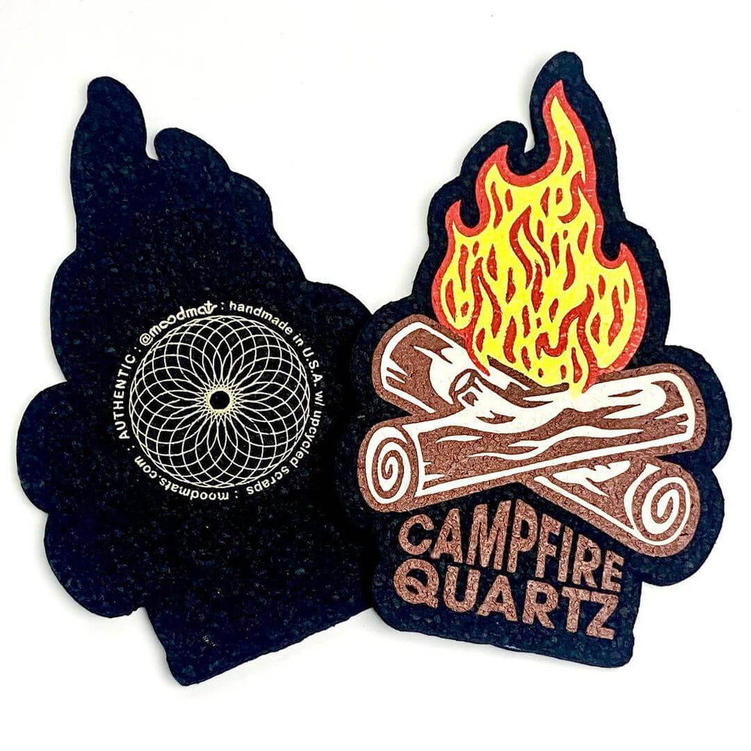 Campfire Quartz Mood Mat featuring vibrant flame and log design, eco-friendly, made from recycled wetsuits, stylish accessory.