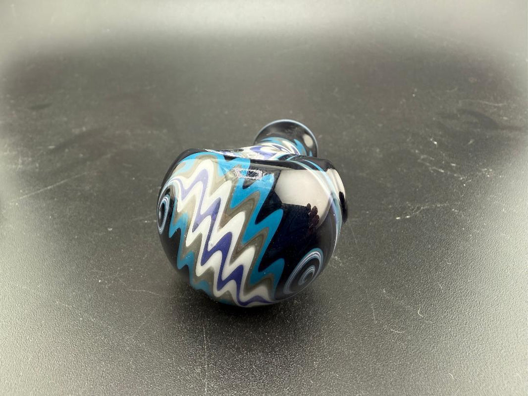 Vibrant Mcdoogle Glass Mini Wig Wag Pipe featuring bold blue and white zigzag linework, handcrafted in Spokane, WA.