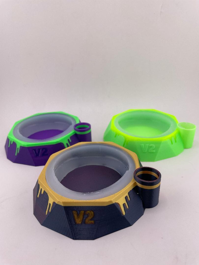 Kandy Custom Focus V Carta 2 base stabilizer in colorful designs, including purple, green, and gold finishes.