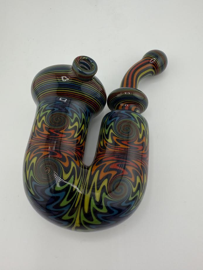 Mcdoogle Sherlock Line Work glass pipe featuring colorful spiral patterns in vibrant hues.