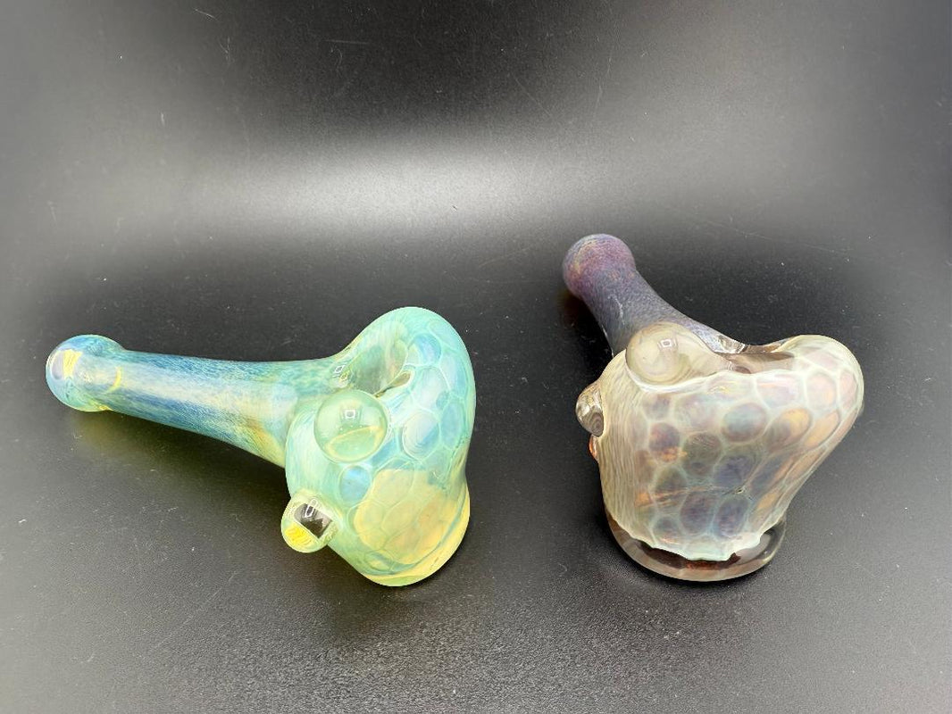 SBJ Honeycomb Tech Glass Pipes in vibrant green and royal purple with intricate honeycomb design.