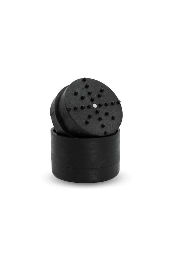 Stache Hemp Grinder showing a sleek black 3-piece design for efficient herb grinding.