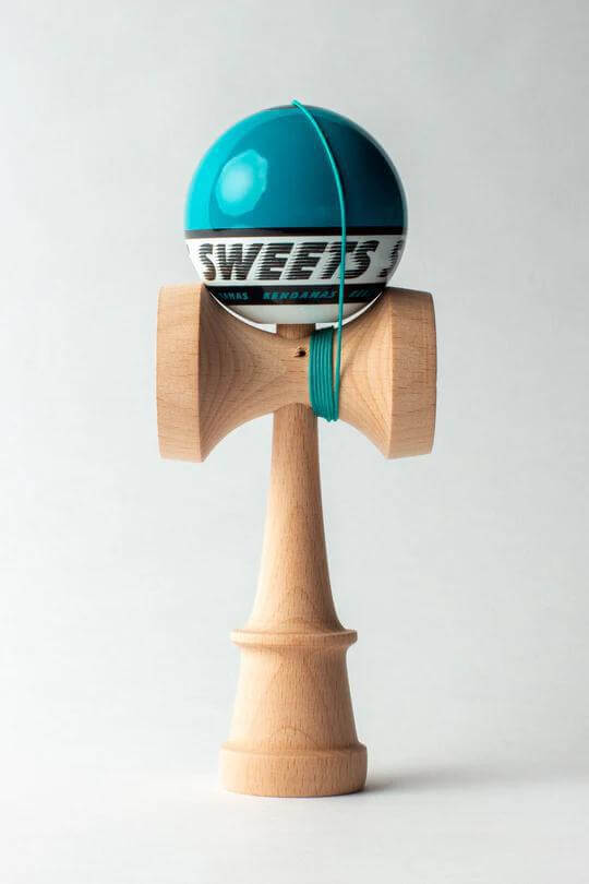 Sweets Kendama Starter Sticky Clear, blue ken with wood handle, perfect for beginner players learning kendama.