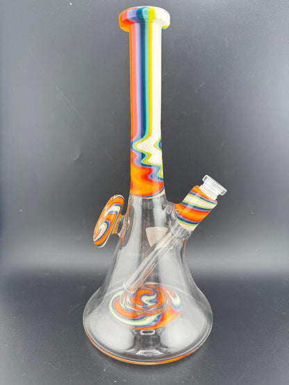 Filla John Glass Circus Beaker 10mm 45° with rainbow colors, durable design for smooth hits.