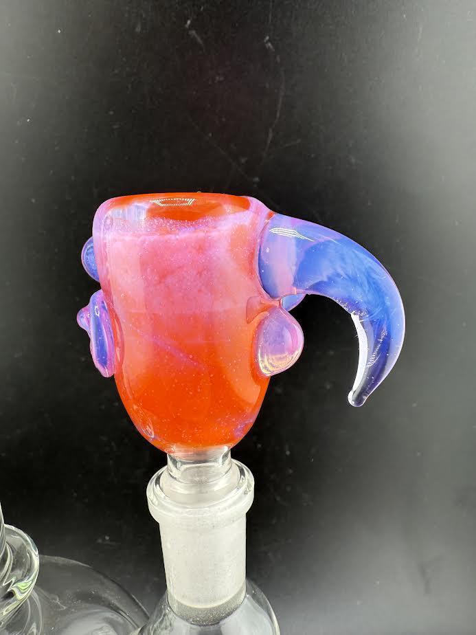 Colorful 14mm glass slide with unique horn design, perfect for enhancing your water pipe experience.