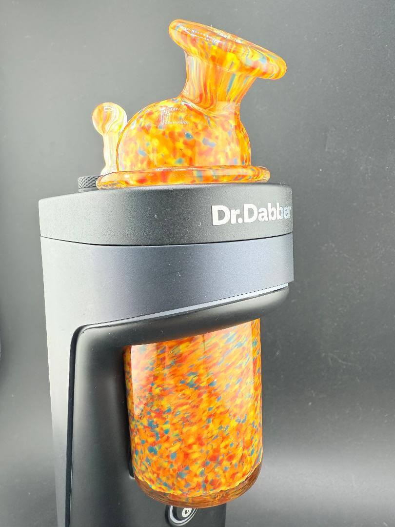 Handcrafted Paulson Pieces Dr. Dabber Switch 2 Replacement Glass & Cap in vibrant orange confetti design.