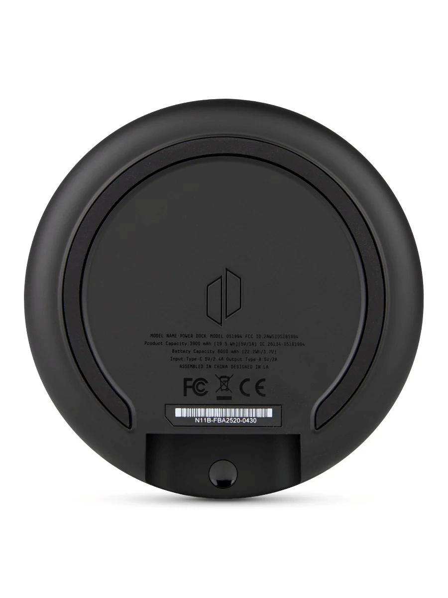 Bottom view of Puffco Peak Pro Power Dock showcasing its FCC certification and design features.