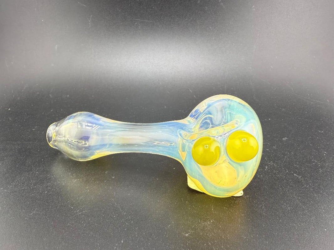 Elbow Tim Glass Fume pipe with yellow accents, handcrafted in Spokane, WA, showcasing unique color and craftsmanship.