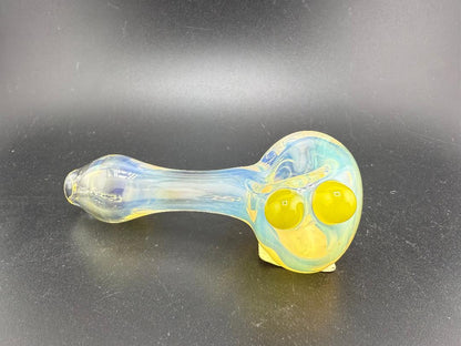 Elbow Tim Glass Fume pipe with yellow accents, handcrafted in Spokane, WA, showcasing unique color and craftsmanship.