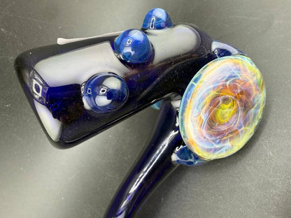 Beer Glass Sherlock Pipe - Cobalt Blue w/ Chaos Fumed Pendant Attachment featuring vibrant colors and intricate design.