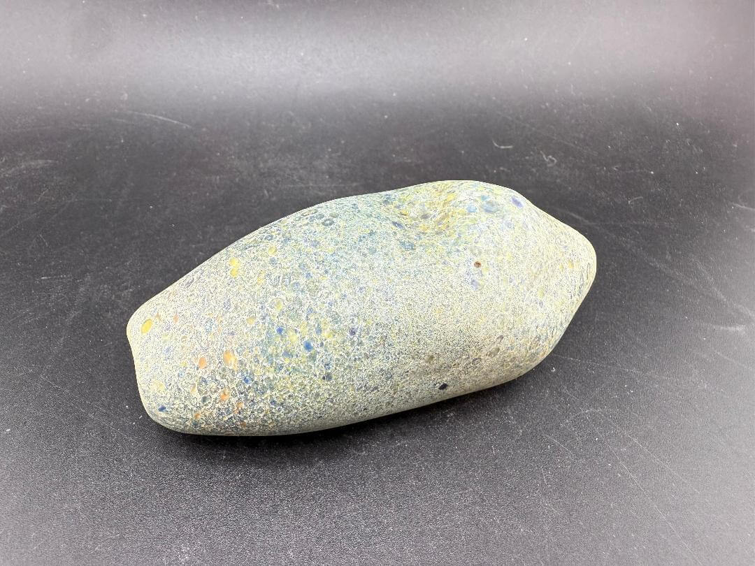 Berning Glass Novelty Pipe - Speckled Rock Pipe shown from a side angle with a textured stone appearance.