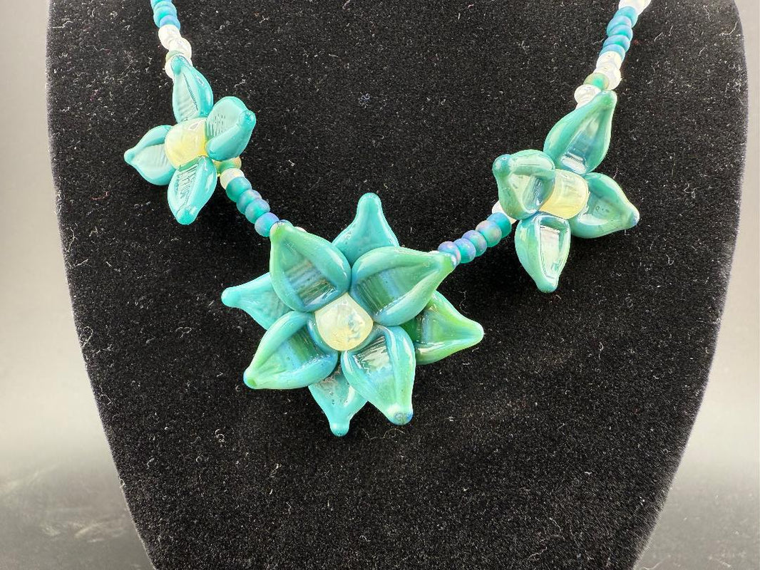 Handmade Pablos Glass Flower Beaded Necklace with turquoise flower beads for a unique boho-chic style.