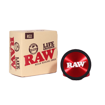 RAW Life Grinder in red with modular design, packaged in box for easy use and maintenance.